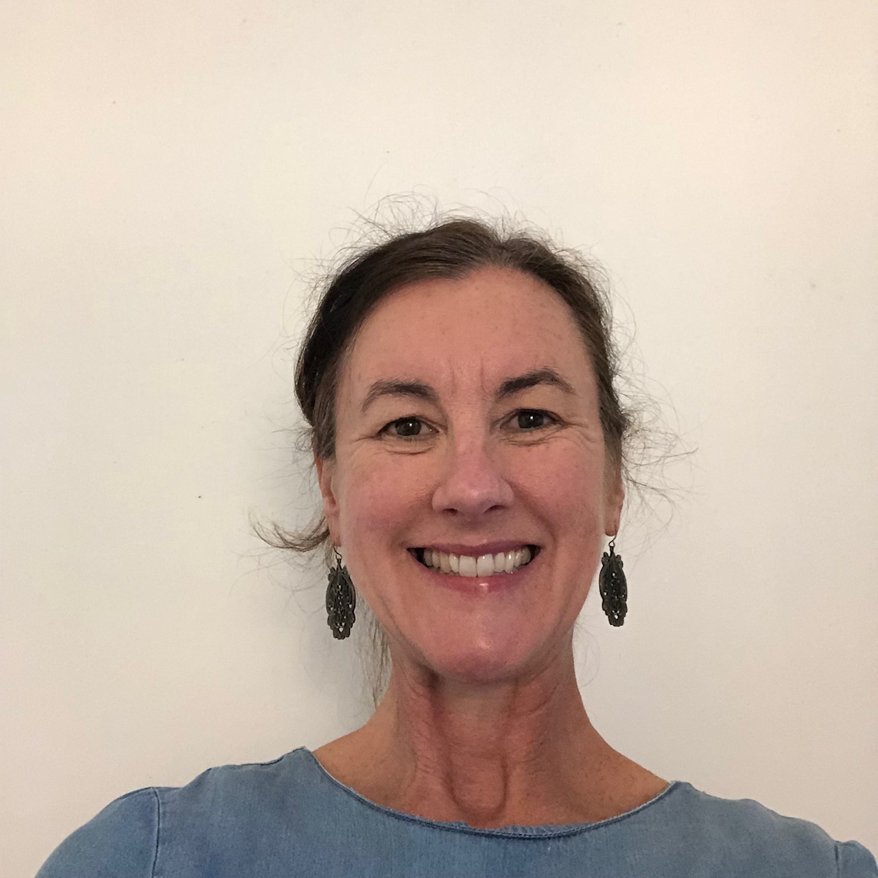 Professional headshot photo of  Tazmin Clingan, medical practitioner